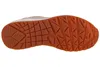 The underside of a beige and orange sneaker. Anteprima dell’immagine prodotto