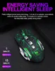 A gaming mouse with green accents is shown on a dark surface, with text highlighting its energy-saving features. Produktbild-Vorschau