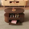 A living room scene with a coffee table and a media console. Produktbild-Vorschau