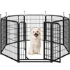 A white dog sits inside a black metal playpen. Produktbild-Vorschau