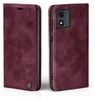 A burgundy flip case for a smartphone is shown from two angles, front and side. Produktbild-Vorschau