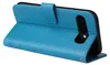 A blue flip case for a smartphone is shown open, revealing the phone's camera module. Produktbild-Vorschau