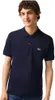 A man wearing a navy blue Lacoste polo shirt. Produktbild-Vorschau