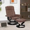 A brown recliner chair and ottoman are shown in a room with a bookshelf in the background. Voir les images du produit