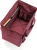 An open maroon duffel bag with internal pockets and compartments. Anteprima dell’immagine prodotto