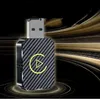 A USB car adapter with a carbon fiber pattern and a play button logo, set against a dark background with abstract golden streaks. Produktbild-Vorschau