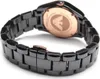 A close-up view of the back of a black ceramic Emporio Armani watch with a rose gold clasp. Voir les images du produit