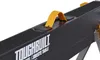 A close-up view of a black jobsite table with a yellow handle and textured grip. Anteprima dell’immagine prodotto