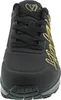 A close-up, front-facing view of a black Skechers sneaker with gold heart detailing. Voir les images du produit