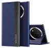 A dark blue phone case with a transparent window is shown from multiple angles. Produktbild-Vorschau