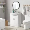 A clean and modern bathroom scene featuring a white vanity with a sink and a toilet. Produktbild-Vorschau