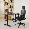 A woman is organizing items on a shelf next to a desk and an ergonomic chair. Produktbild-Vorschau