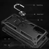 An exploded view diagram of a black phone case, showing its different layers and components. Produktbild-Vorschau