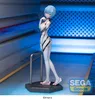 A figurine of Rei Ayanami from Evangelion in a white and blue plugsuit, standing on a display base with a metallic support. Náhľad obrázku produktu