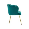 A side view of a teal velvet chair with gold legs against a white background. Anteprima dell’immagine prodotto