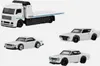 A white tow truck and three white Nissan Skyline model cars are displayed against a white background. Anteprima dell’immagine prodotto