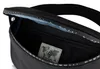 Close-up view of the inside of a black belt bag. Anteprima dell’immagine prodotto