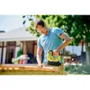 A man is using a nail gun to assemble wooden planks outdoors. Anteprima dell’immagine prodotto
