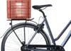 A close-up side view of the rear of a bicycle with a terracotta-colored crate attached to the rear rack. Náhled obrázku produktu