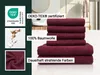 A stack of burgundy towels with informational text overlays and logos. Produktbild-Vorschau