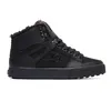 A black high-top DC Shoes sneaker with fur lining. Produktbild-Vorschau
