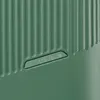 A close-up view of the textured surface of a green suitcase with the brand logo embossed. Produktbild-Vorschau