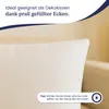 Close-up of a white pillow with text overlays. Produktbild-Vorschau
