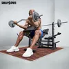 A man is doing bicep curls with a barbell on a weight bench, with a gym mat on the floor. Náhľad obrázku produktu