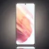 A smartphone with a pink and white abstract wallpaper on its screen, set against a gradient gray background. Produktbild-Vorschau
