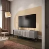 A modern living room scene featuring a TV stand with a television. Produktbild-Vorschau