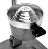 A close-up view of the top part of a manual juicer, focusing on the juicing cone and collection bowl. Podgląd zdjęcia produktu