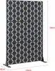 A black decorative screen with a geometric pattern, shown standing on a white background with dimensions indicated. Náhľad obrázku produktu
