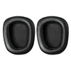 Two black ear pads for headphones are shown against a white background. Produktbild-Vorschau