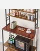 A kitchen baker's rack filled with kitchen appliances and items. Produktbild-Vorschau