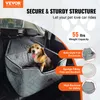A dog is sitting in a car seat in the back seat of a car. The image has marketing text and graphics. Náhľad obrázku produktu