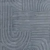 A close-up view of a textured rug with a geometric pattern. Anteprima dell’immagine prodotto