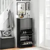 A hallway or entryway scene featuring a shoe cabinet, a bench with a cushion, and a coat hanging on hooks. Produktbild-Vorschau