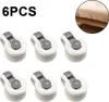 Six white and gray clips are arranged in two rows on a white background, with a close-up inset image showing how the clips are used on bedding. Produktbild-Vorschau