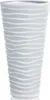 A white planter with a wavy pattern. Produktbild-Vorschau