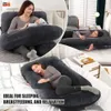 A collage of images showing a woman using a U-shaped pregnancy pillow for sleeping, breastfeeding, and relaxation. Náhled obrázku produktu