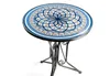 A round mosaic-top table with a black metal base, shown against a white background. Produktbild-Vorschau