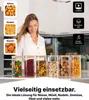 A woman is standing in a kitchen, with a row of glass storage jars filled with various food items in front of her. There are also icons and text overlays highlighting product features. Náhľad obrázku produktu