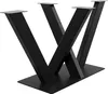 A black metal table base with a spider-like design, shown against a white background. Náhled obrázku produktu