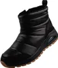 A black puffer boot with a brown sole. Anteprima dell’immagine prodotto