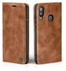 Two views of a brown leather flip case for a smartphone, shown against a white background. Produktbild-Vorschau