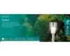A solar stake light is shown in a garden setting with foliage in the background. Produktbild-Vorschau