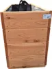 A wooden planter box with black handles and liner. Produktbild-Vorschau