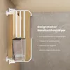 A white towel warmer mounted on a wall with towels hanging on it, next to a textured wall. Anteprima dell’immagine prodotto