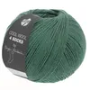 A ball of green yarn with a dark label. Produktbild-Vorschau