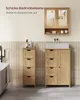 A bathroom vanity and cabinet set with a sink and mirror. Produktbild-Vorschau